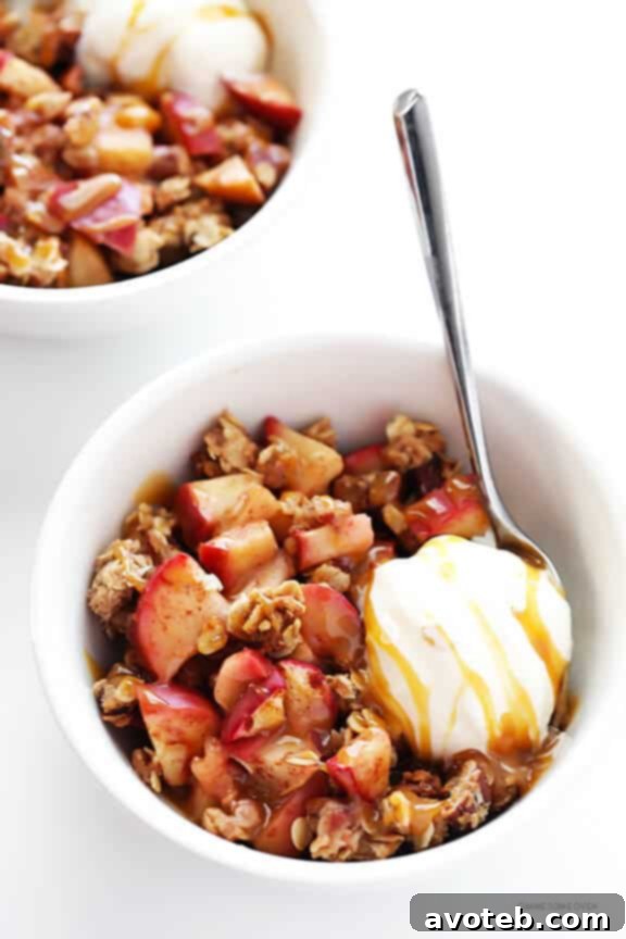 Apple Crisp Served with Ice Cream and Caramel Sauce