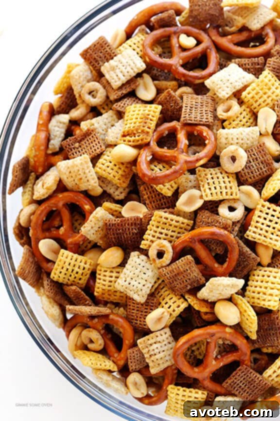 A batch of savory Coconut Oil Chex Mix served in a rustic bowl.