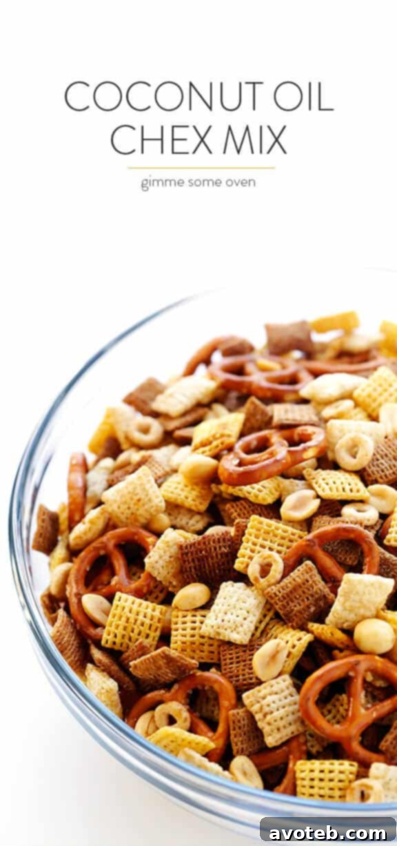 A large serving bowl filled with irresistible Coconut Oil Chex Mix, ready for sharing.