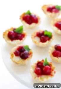 Super-Easy Cranberry Baked Brie Bites, a perfect holiday appetizer for entertaining