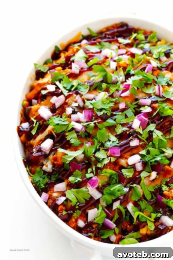 Close-up of the baked BBQ Chicken Quinoa Casserole, with melted cheese.