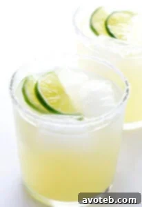 Mezcal Margarita cocktail with a salt rim and lime wedge