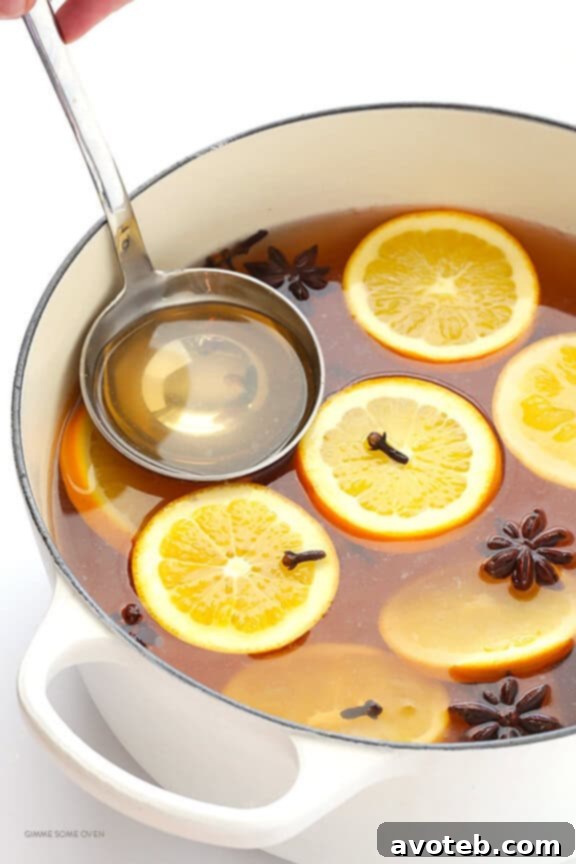 Cozy White Wine Elixir 3 Mulled White Wine Recipe -- easy to make, and so deliciously warm and comforting | gimmesomeoven.com