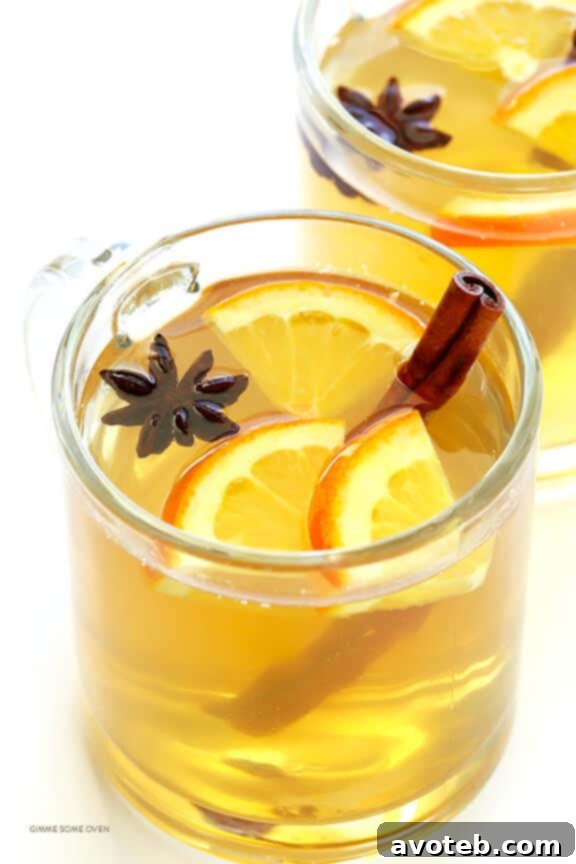 Cozy White Wine Elixir 4 Mulled White Wine Recipe -- easy to make, and so deliciously warm and comforting | gimmesomeoven.com