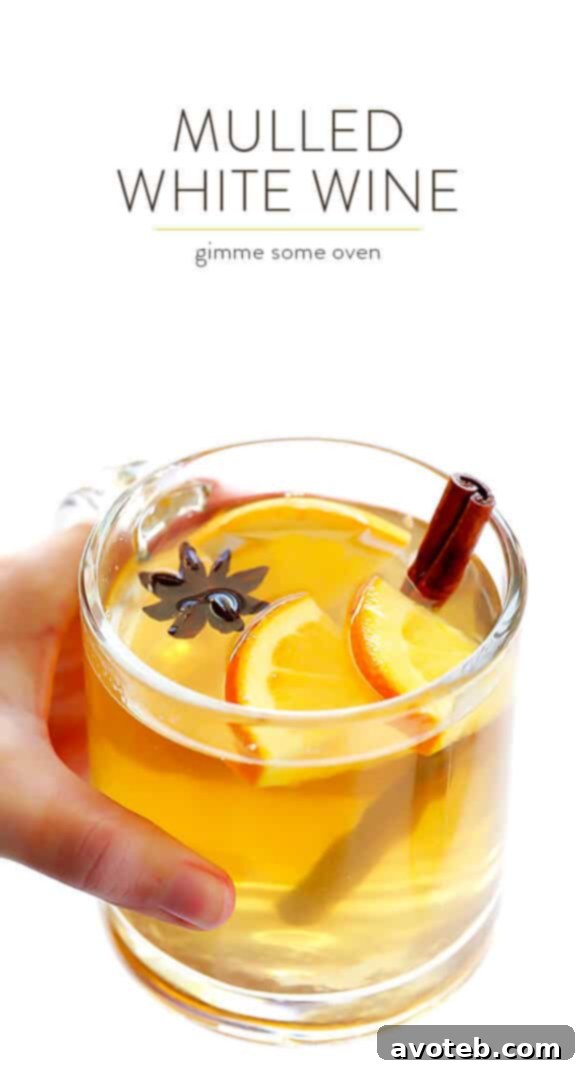 Cozy White Wine Elixir 6 Mulled White Wine Recipe -- easy to make, and so deliciously warm and comforting | gimmesomeoven.com