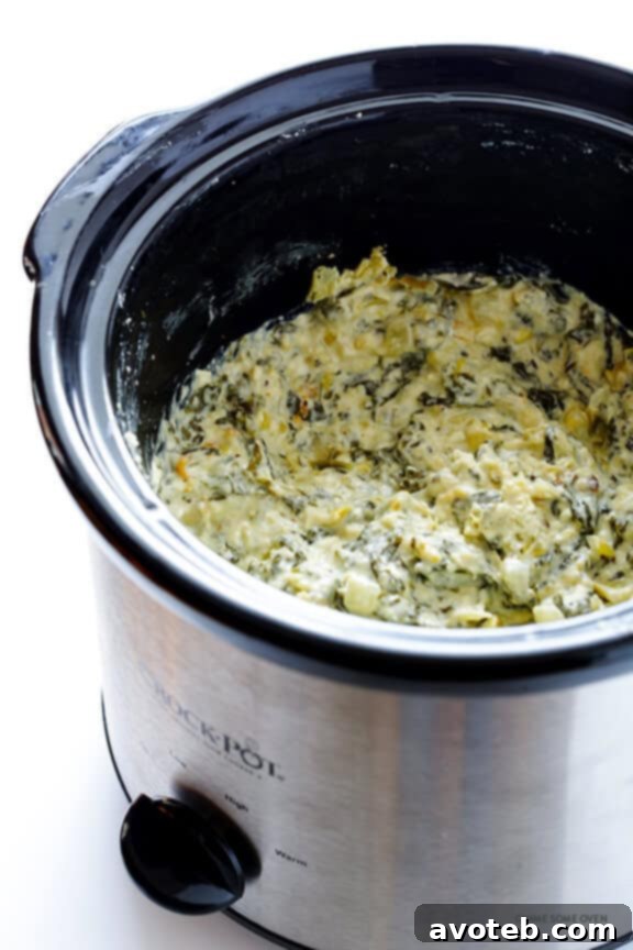 Slow Cooker Spinach Artichoke Dip Recipe | gimmesomeoven.com