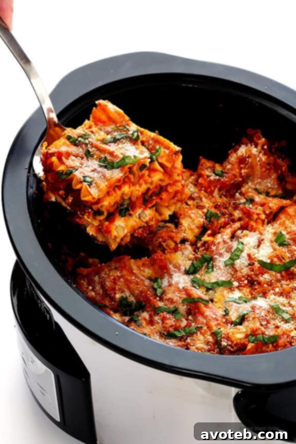 This Slow Cooker Lasagna recipe is easy to make in the crock pot, it takes just minutes to prep, and you can customize it with all of your favorite ingredients.