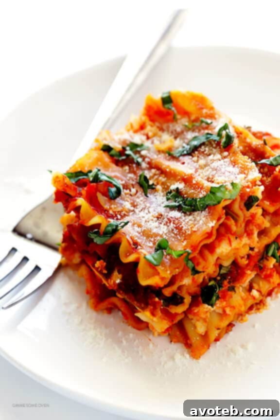This Slow Cooker Lasagna recipe is easy to make in the crock pot, it takes just minutes to prep, and you can customize it with all of your favorite ingredients.