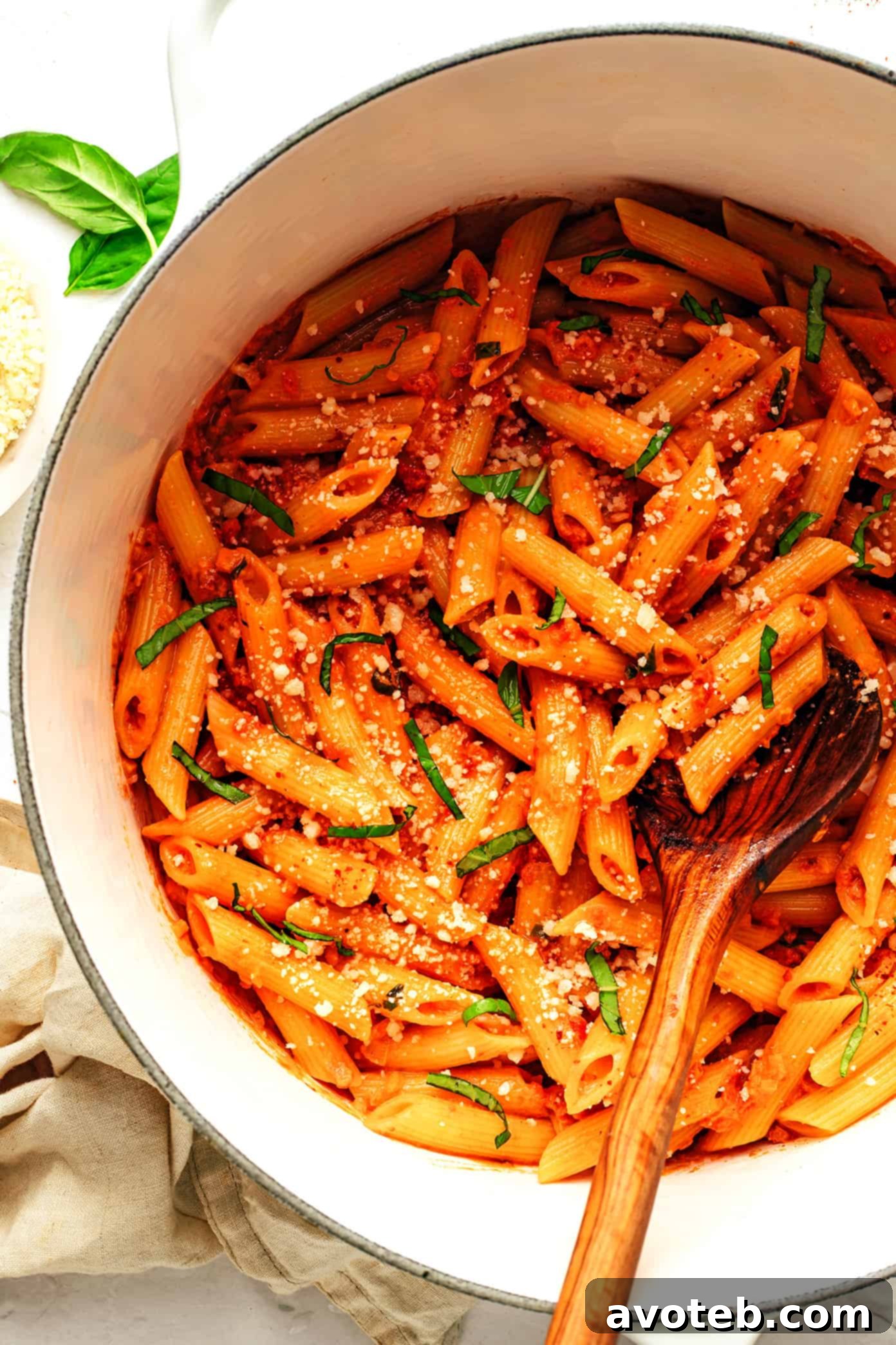 Velvety Vodka Cream Penne 2 Delicious Penne Alla Vodka pasta dish, creamy and garnished with fresh basil.