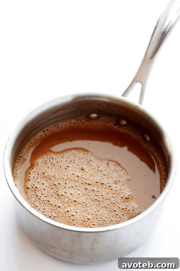 Velvet Nut Blend Hot Chocolate 4 Close-up of creamy Almondmilk Cashewmilk Hot Chocolate in a white mug, ready to be enjoyed. Naturally vegan and rich. | gimmesomeoven.com