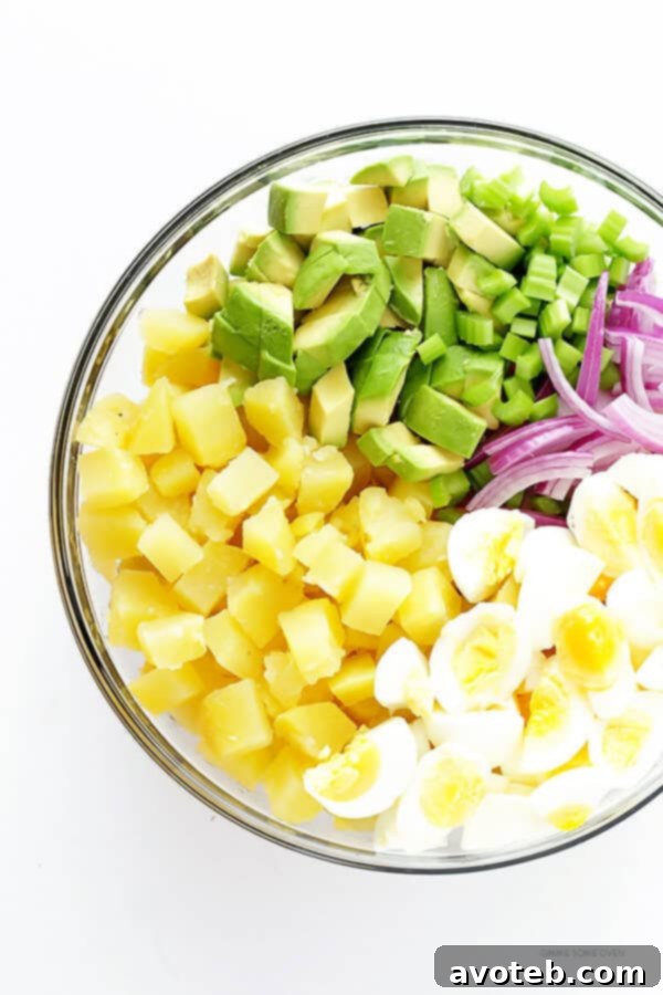 Avocado Potato Salad -- classic creamy potato salad is kicked up a notch with some delicious avocados! | gimmesomeoven.com