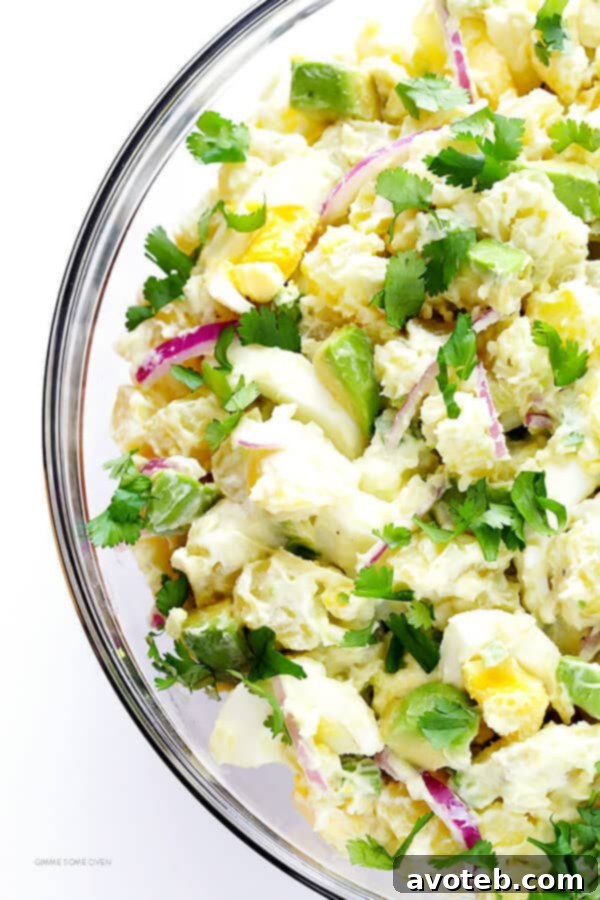 Avocado Potato Salad -- classic creamy potato salad is kicked up a notch with some delicious avocados! | gimmesomeoven.com