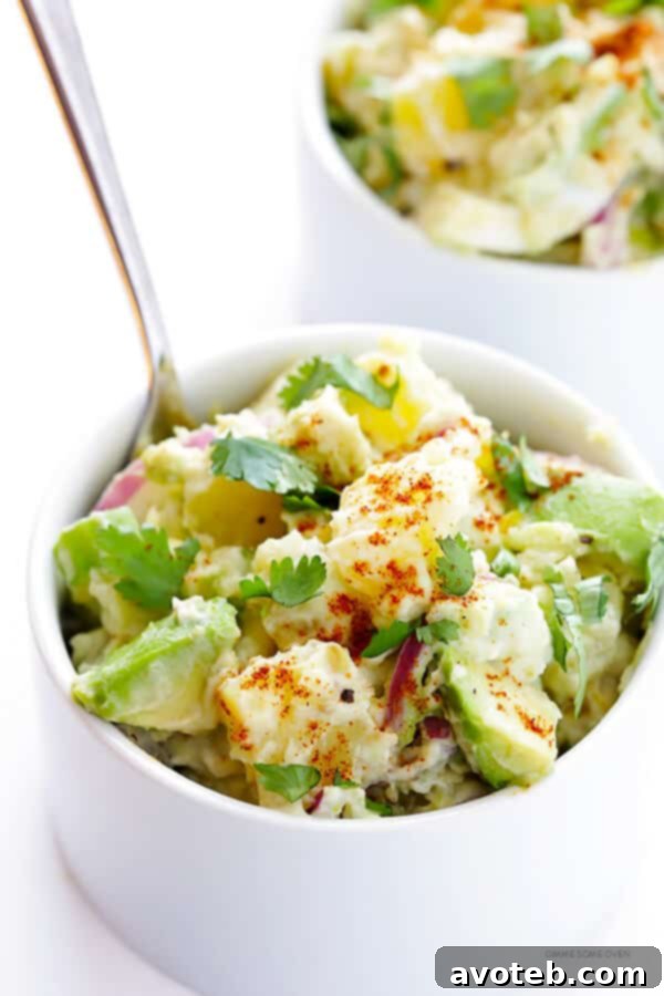 Avocado Potato Salad -- classic creamy potato salad is kicked up a notch with some delicious avocados! | gimmesomeoven.com