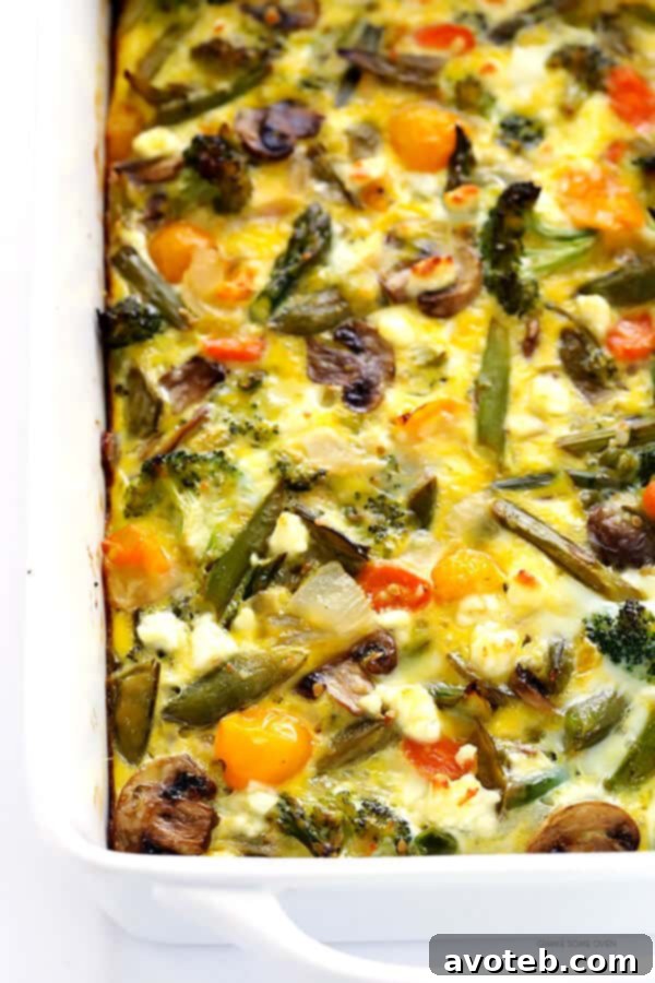 Fresh Spring Egg Bake 5 The golden-baked Spring Vegetable Egg Casserole, emerging from the oven – a testament to simple ingredients creating a delicious, vibrant, and crowd-pleasing dish for any occasion.