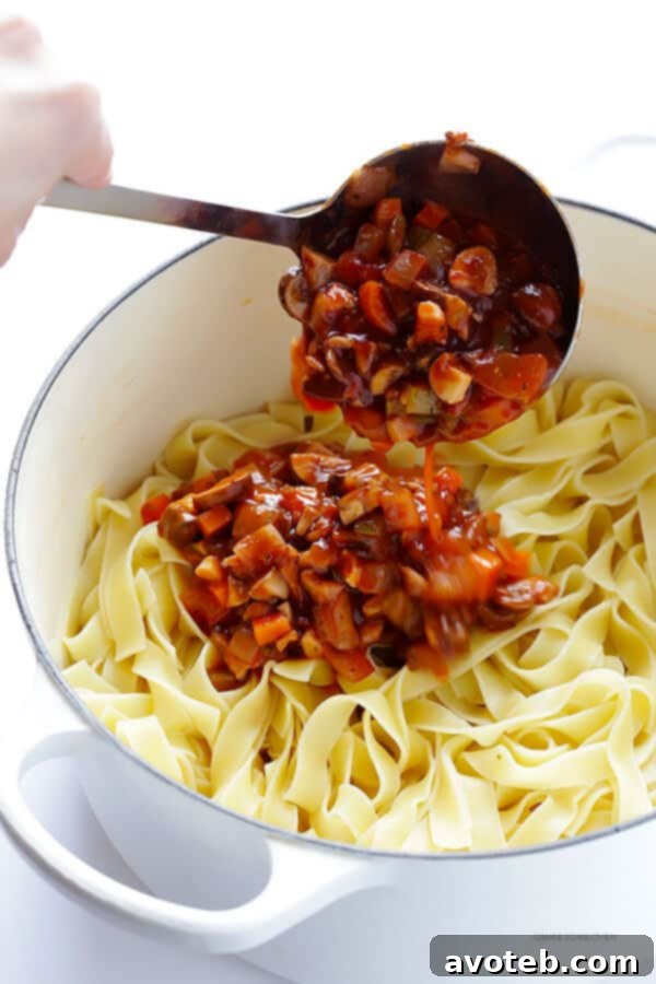 Hearty Mushroom Ragu 5 Cooked tagliatelle pasta ready to be tossed with the rich mushroom bolognese sauce.