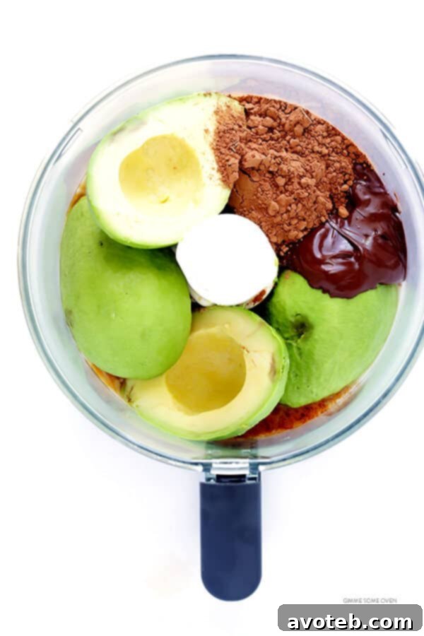 Dark Chocolate Avocado Mousse -- quick and easy to make with healthier, everyday ingredients. Plus it's also naturally gluten-free, vegan, and absolutely delicious!