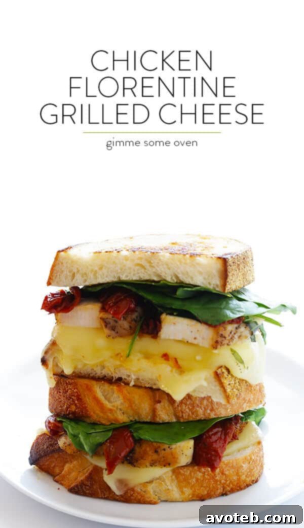 A final shot of the completed Chicken Florentine Grilled Cheese sandwich, sliced and ready to eat.