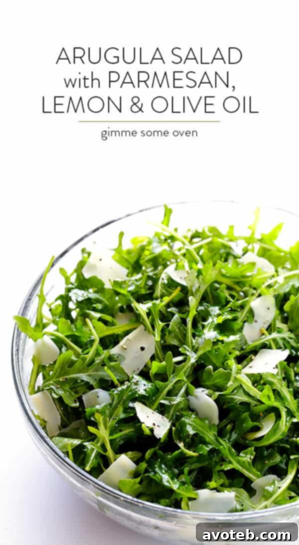 A beautifully composed flat lay of the 5-Ingredient Arugula Salad, highlighting its simplicity and appeal as a healthy, quick meal. | gimmesomeoven.com