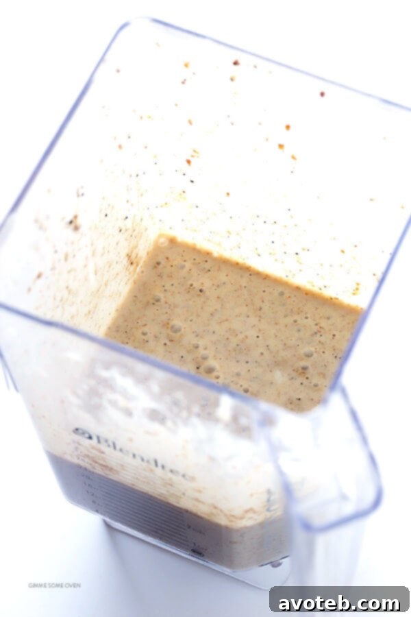 All ingredients for the Banana Chai Smoothie are poured into a blender, ready to be mixed.