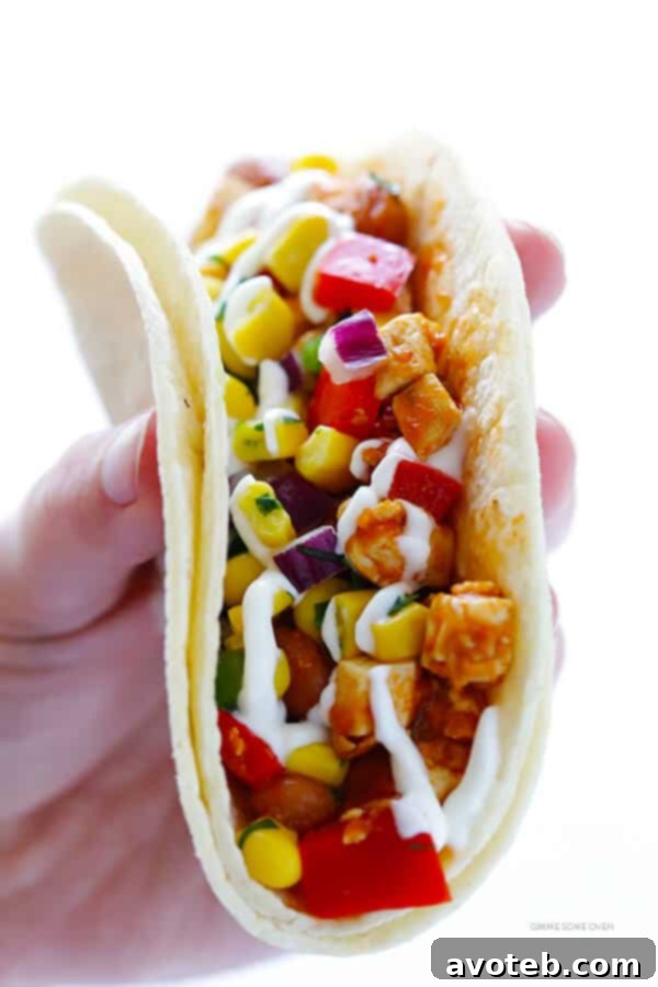 A close-up of colorful and flavorful Chipotle Sofritas Tacos ingredients ready to be served.