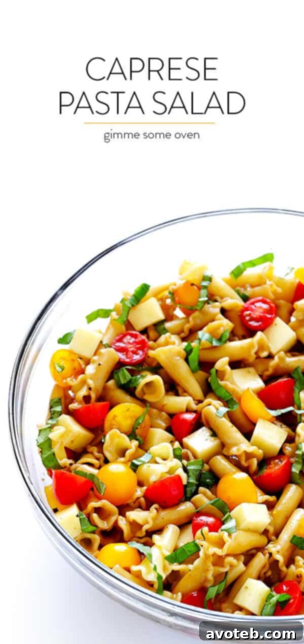 This Caprese Pasta Salad Recipe is quick and easy to make, tossed with a delicious balsamic vinaigrette, and perfect for picnics, potlucks, or just a regular weeknight meal! | gimmesomeoven.com