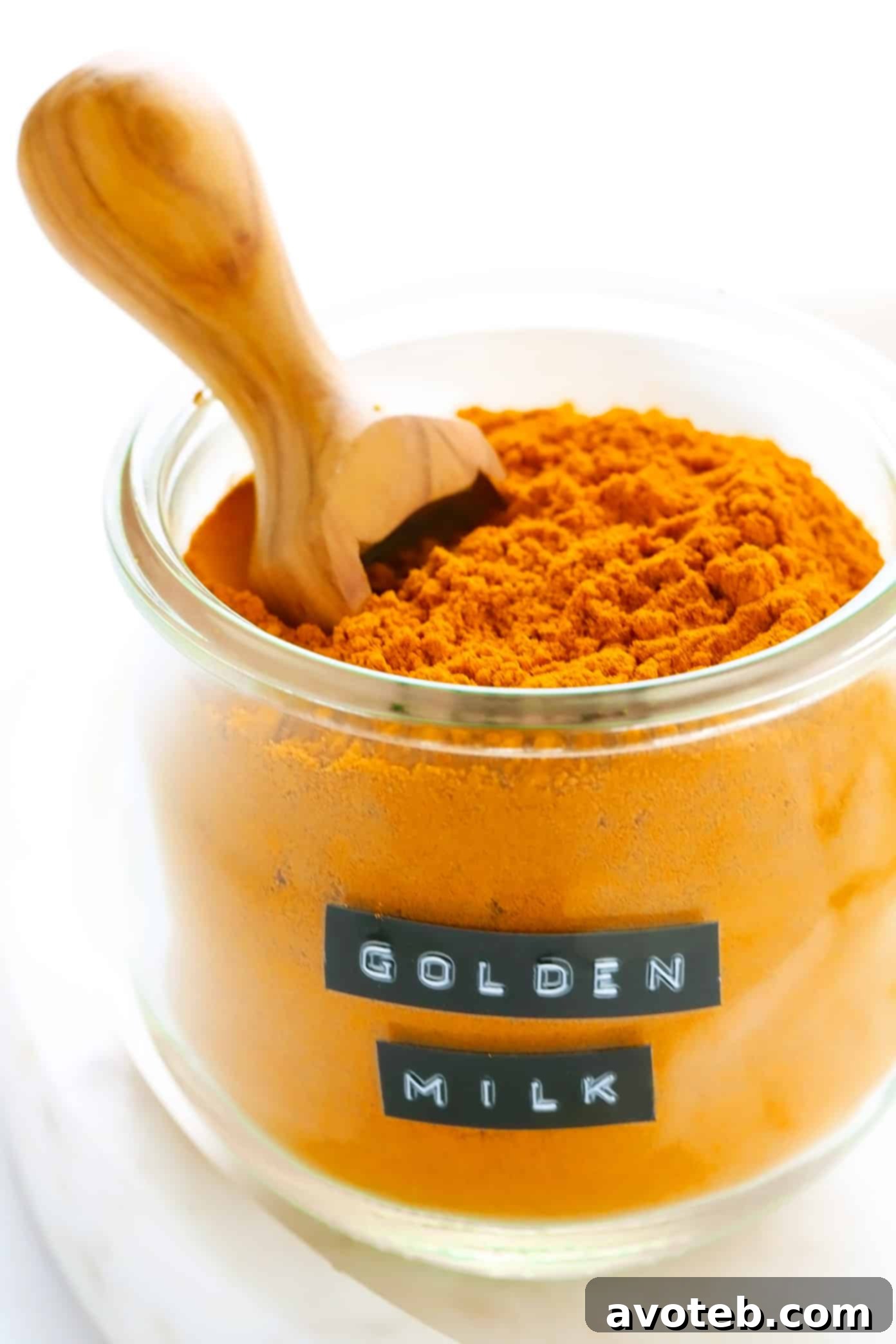 A jar of pre-mixed golden milk powder for convenience.