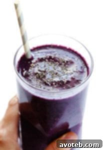A delicious Blueberry Kale Smoothie in a glass, ready for enjoyment.