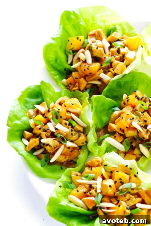 Delicious and healthy Orange Chicken Lettuce Wraps, naturally sweetened with honey and Florida's Natural orange juice. A perfect quick and easy summer meal.