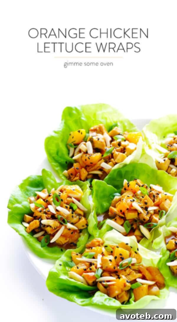 A beautifully arranged serving platter of Orange Chicken Lettuce Wraps, highlighting their appeal as a fresh and healthy meal.