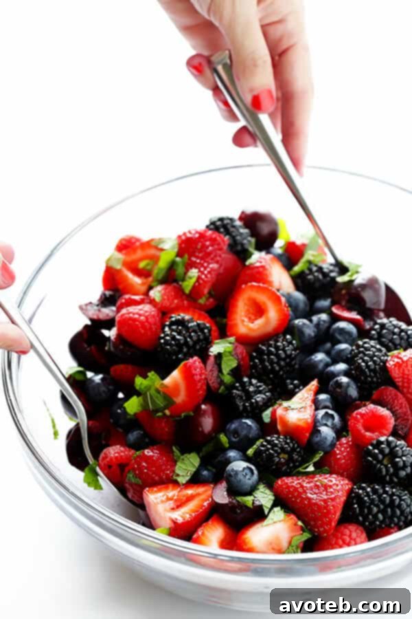 Make-Ahead Salads Loved By All 6 Berry Fruit Salad: A beautiful and refreshing fruit salad made with a mix of fresh seasonal berries like strawberries, blackberries, blueberries, and cherries. Perfect for summer gatherings.