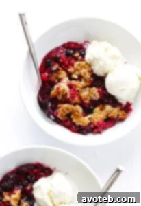 Berry Almond Crisp with fresh berries and a golden topping.