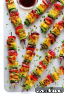 Grilled Rainbow Hawaiian Chicken Kabobs, a colorful and delicious summer meal.