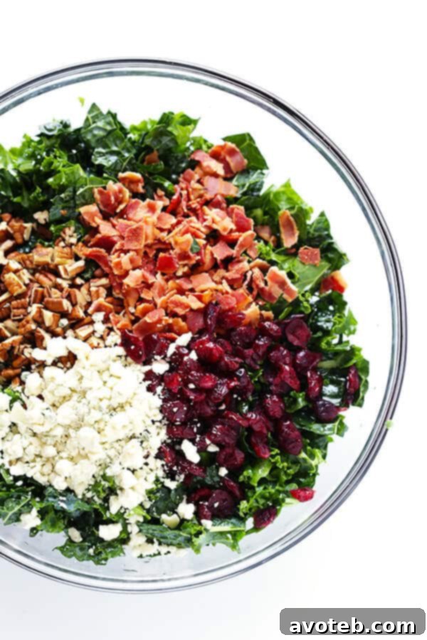 Smoky Bacon & Bold Blue Cheese Kale Salad 3 A vibrant Kale Salad with Bacon and Blue Cheese, highlighting the colorful ingredients and a tantalizing red wine shallot vinaigrette.