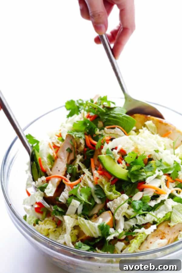 This Asian Chicken Chopped Salad recipe is quick and easy to make, packed with fresh ingredients and zesty chicken, and tossed with a heavenly creamy sesame ginger vinaigrette. So delicious!! | gimmesomeoven.com