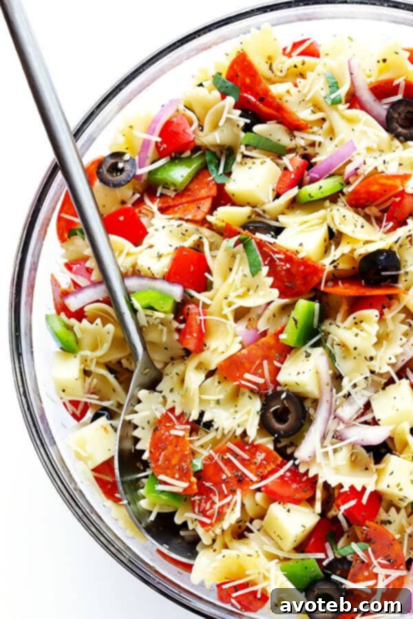 Easy and delicious Pizza Pasta Salad recipe with classic pizza toppings and a simple Italian vinaigrette