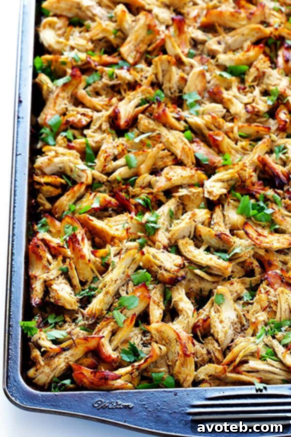 Sheet pan full of golden crispy chicken carnitas