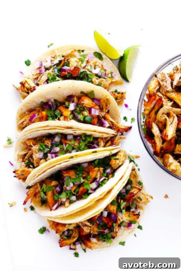 A vibrant platter of Slow Cooker Crispy Chicken Carnitas