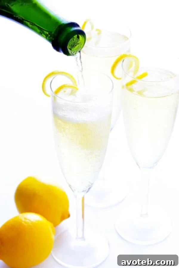 Ingredients for a French 75 Cocktail: Gin, Lemon, Simple Syrup, Champagne Bottles