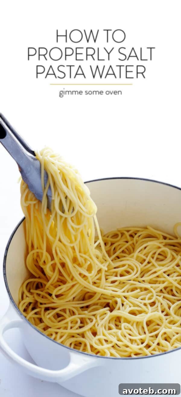 Freshly cooked, perfectly seasoned pasta being drained in a colander, ready for sauce. Emphasizing the best way to drain pasta.