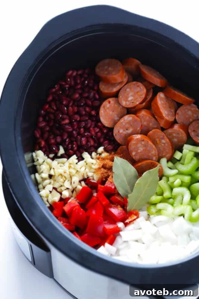 Crock Pot Red Beans and Rice -- this easy recipe only takes a few minutes to prep, and it's full of the BEST Creole flavors. | gimmesomeoven.com