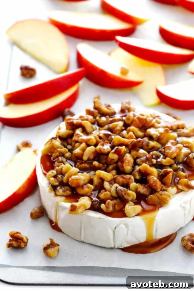 This 10-Minute Caramel Apple Baked Brie recipe is super-easy to make990