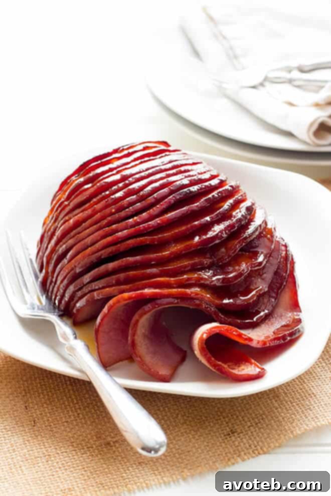 Slow Cooker Honey Glazed Ham -- one of 12 ways to rock your crock-pot this Thanksgiving! | gimmesomeoven.com