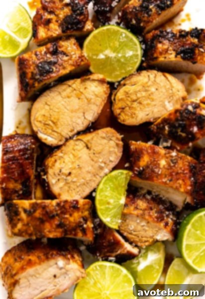 Close-up of a perfectly grilled Ginger Lime Pork Tenderloin