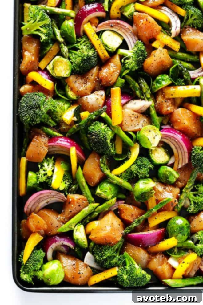 Sheet Pan Chicken Stir Fry, featuring perfectly diced onions and colorful vegetables.