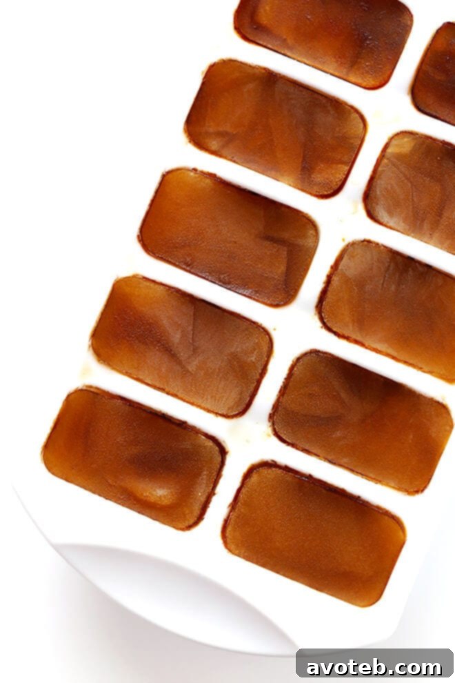 Close-up of frozen coffee cubes in an ice tray, ready for smoothie blending