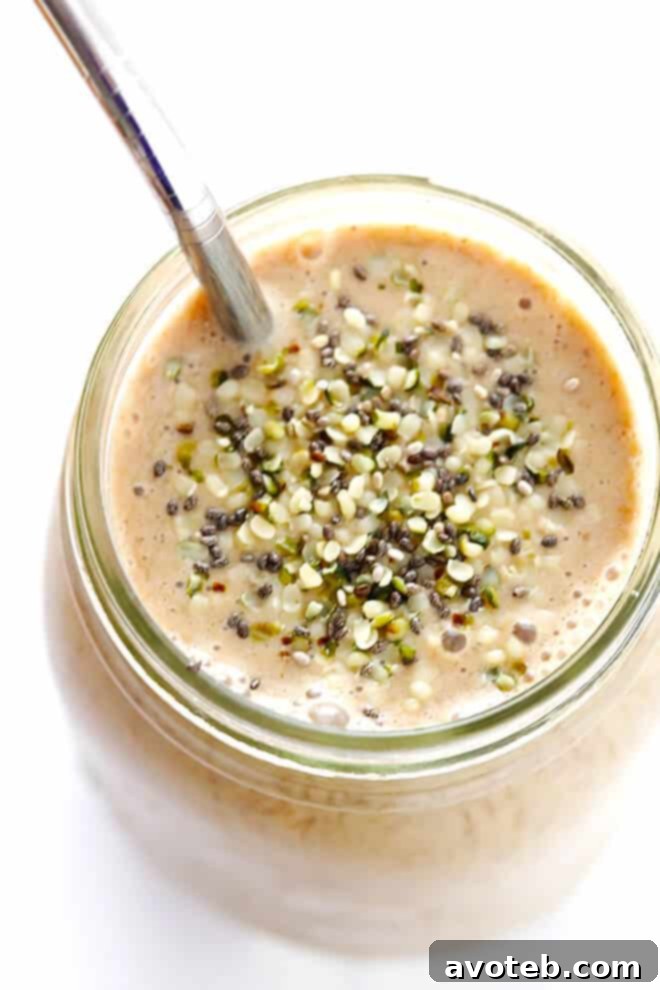 Blender with Coffee Protein Smoothie ingredients mid-blend, creating a creamy texture