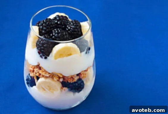 Delicious and vibrant breakfast parfait with fresh fruit, granola, and yogurt