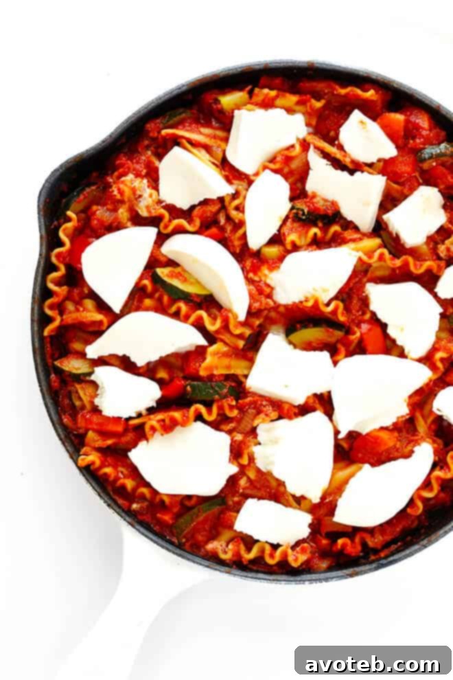 This Skillet Veggie Lasagna is super-easy to make on the stove, and can be made with all of your favorite vegetables! | gimmesomeoven.com