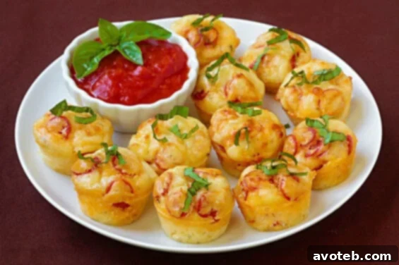 Delicious Pepperoni Pizza Puffs arranged on a white plate