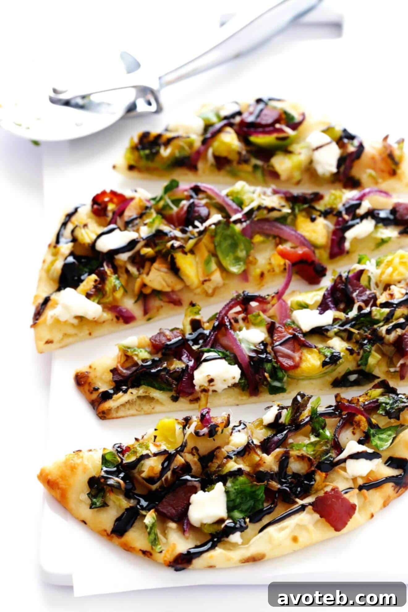These delicious Brussels Sprouts and Bacon Flatbread Pizzas are quick and easy to make, and SO flavorful! Experience the perfect blend of savory and tangy.